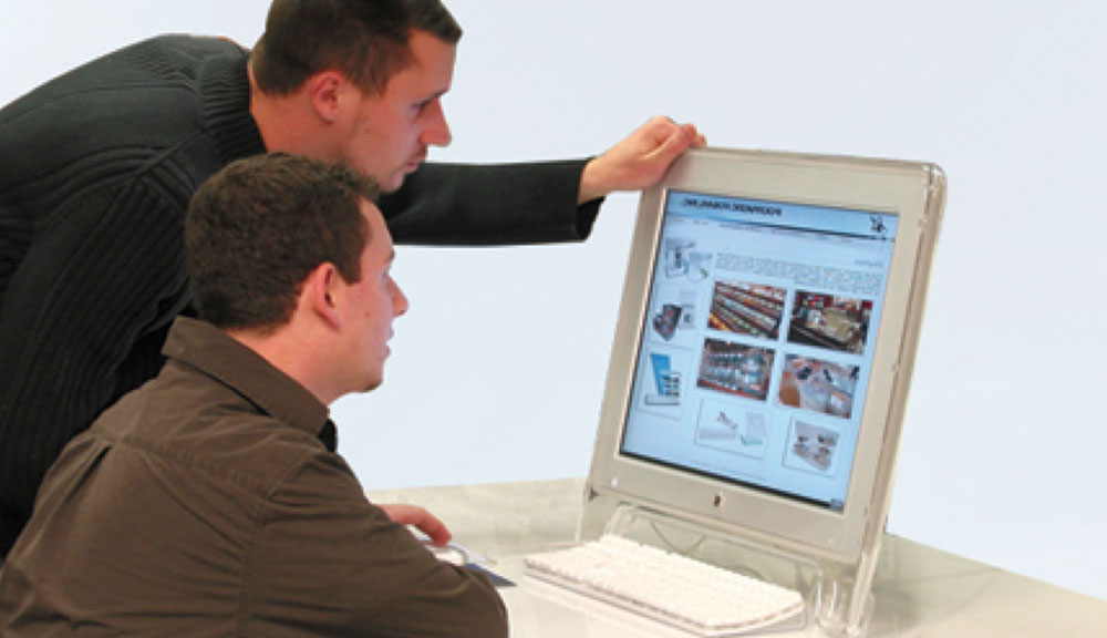 PolyPlastics - Anthony and Mike on the Computer